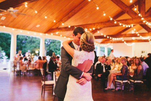 Couple dancing in barn
